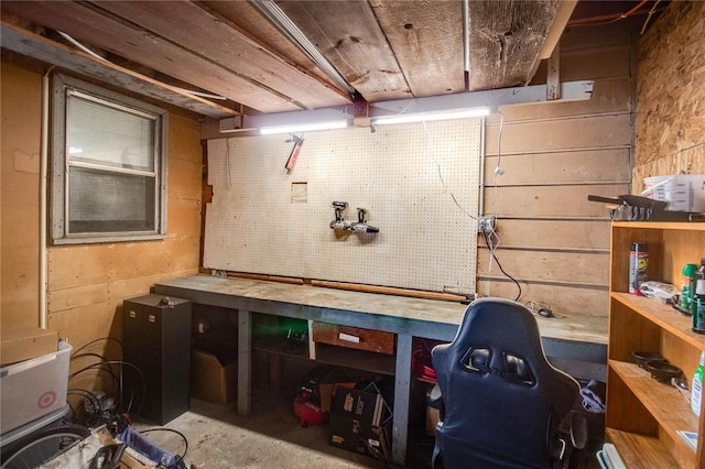 155 Roberts St, Jerseyville, IL 62052 - unfinished basement with a workshop area