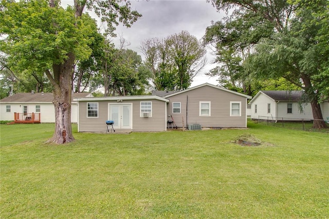 155 Roberts St, Jerseyville, IL 62052 - back of property featuring central air condition unit and a deck