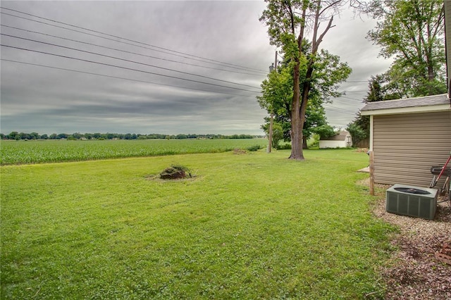 155 Roberts St, Jerseyville, IL 62052 - view of green lawn with central AC unit and a rural view