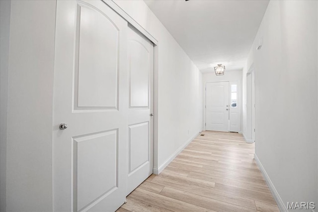346 Fairhaven Ct, Wright City, MO 63390 - corridor featuring light wood-style flooring and baseboards