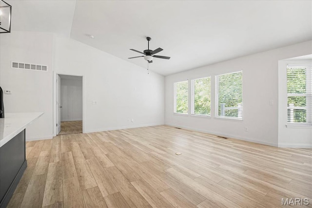 346 Fairhaven Ct, Wright City, MO 63390 - unfurnished living room with vaulted ceiling, a ceiling fan, and light wood finished floors