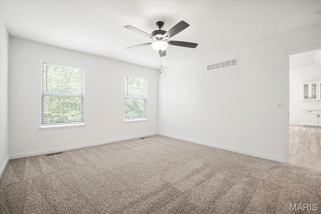 346 Fairhaven Ct, Wright City, MO 63390 - unfurnished room featuring light carpet, ceiling fan, and a smoke detector