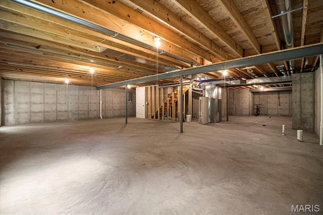 346 Fairhaven Ct, Wright City, MO 63390 - unfinished below grade area featuring water heater and stairway