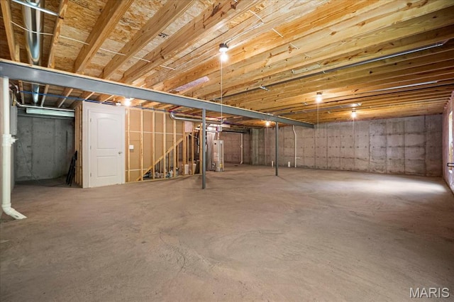 346 Fairhaven Ct, Wright City, MO 63390 - unfinished basement with gas water heater and stairway