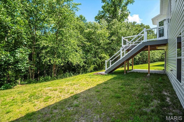 346 Fairhaven Ct, Wright City, MO 63390 - view of green lawn with stairs and a deck