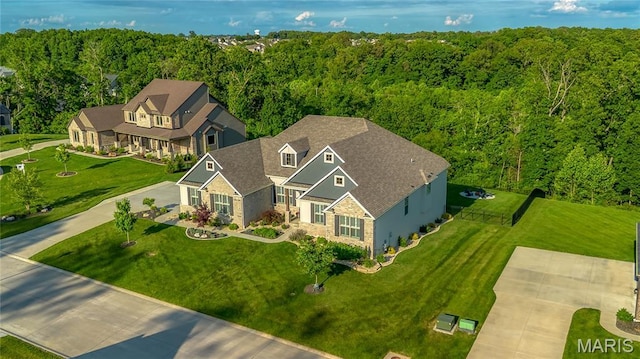 150 Westleigh Manor Dr, Wentzville, MO 63385 - aerial view of property and surrounding area with a heavily wooded area