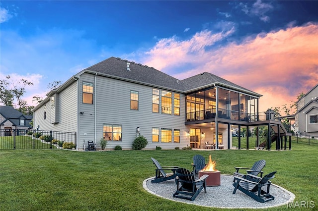 150 Westleigh Manor Dr, Wentzville, MO 63385 - rear view of property with an outdoor fire pit, a patio area, stairs, and a sunroom