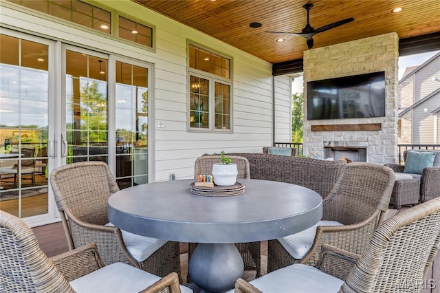 150 Westleigh Manor Dr, Wentzville, MO 63385 - view of patio / terrace featuring a ceiling fan, outdoor dining area, and an outdoor living space with a fireplace