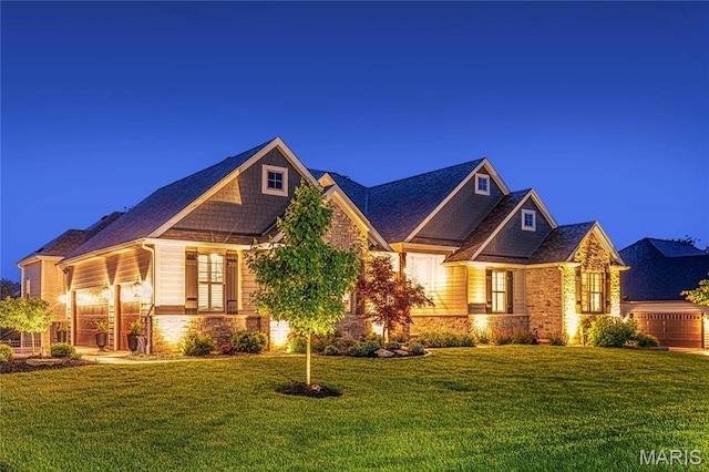 150 Westleigh Manor Dr, Wentzville, MO 63385 - craftsman inspired home with stone siding, a front yard, and roof with shingles