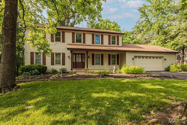 1461 Oak Bluff Ln, Kirkwood, MO 63122 - view of front of house with driveway, an attached garage, a front yard, and covered porch