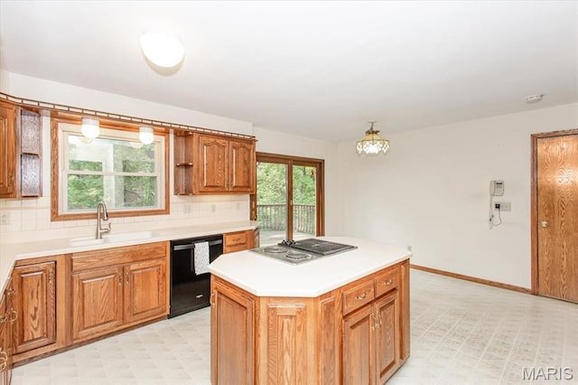 1461 Oak Bluff Ln, Kirkwood, MO 63122 - kitchen featuring dishwasher, light floors, stainless steel stovetop, tasteful backsplash, and light countertops