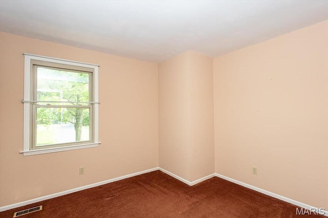 1461 Oak Bluff Ln, Kirkwood, MO 63122 - spare room with dark colored carpet and baseboards