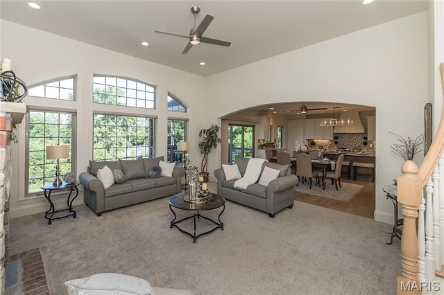 111 N Mosley Rd, Saint Louis, MO 63141 - living area with a ceiling fan, recessed lighting, arched walkways, healthy amount of natural light, and a towering ceiling