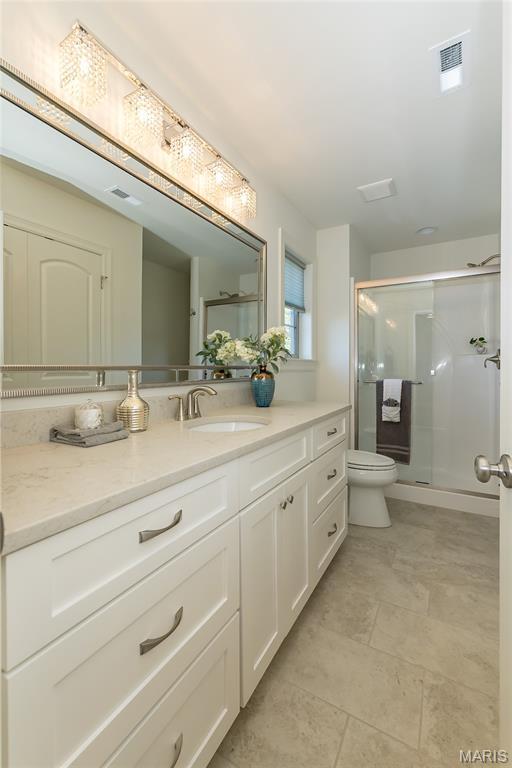 111 N Mosley Rd, Saint Louis, MO 63141 - bathroom with vanity and a shower stall