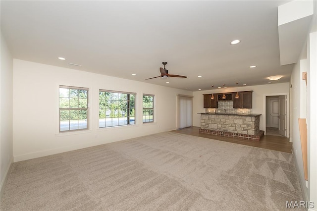 111 N Mosley Rd, Saint Louis, MO 63141 - unfurnished living room featuring carpet, ceiling fan, and recessed lighting