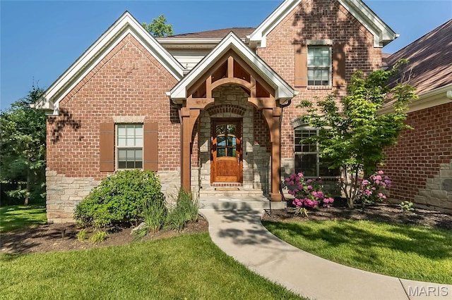111 N Mosley Rd, Saint Louis, MO 63141 - view of front of house with stone siding, brick siding, and a front yard