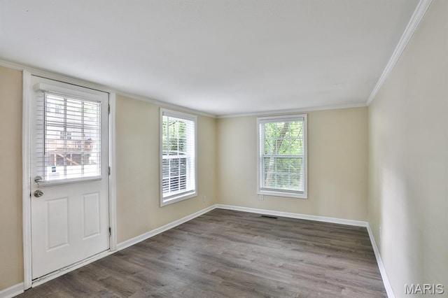 542 Meramec Station Rd Unit C, Valley Park, MO 63088 - spare room with wood finished floors, baseboards, ornamental molding, and plenty of natural light
