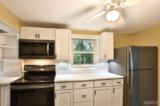 542 Meramec Station Rd Unit C, Valley Park, MO 63088 - kitchen featuring stainless steel appliances, light countertops, white cabinetry, and a ceiling fan