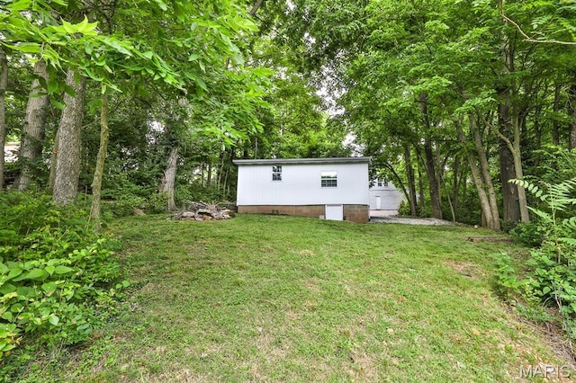 542 Meramec Station Rd Unit C, Valley Park, MO 63088 - view of grassy yard featuring an outbuilding