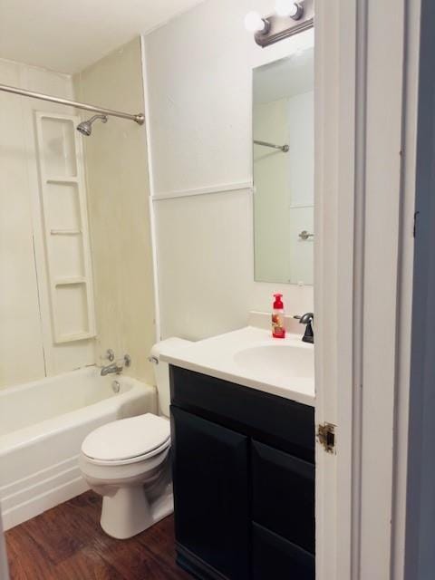 2722 Adeline St, Cape Girardeau, MO 63701 - bathroom with vanity, toilet, wood finished floors, and shower / bathtub combination