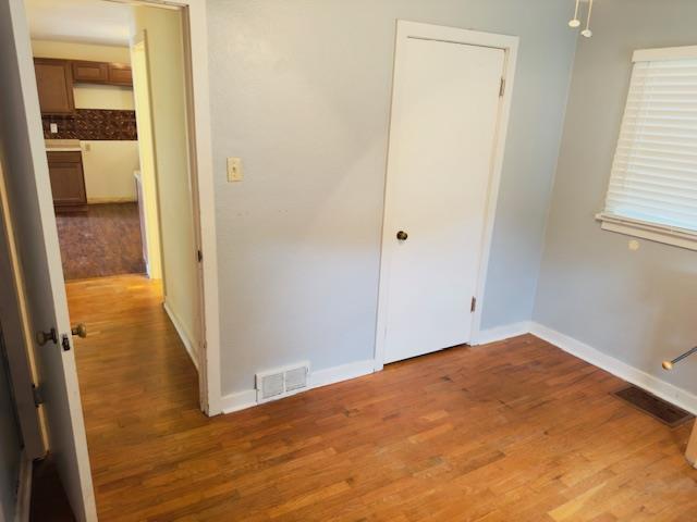 2722 Adeline St, Cape Girardeau, MO 63701 - unfurnished bedroom featuring wood finished floors and baseboards
