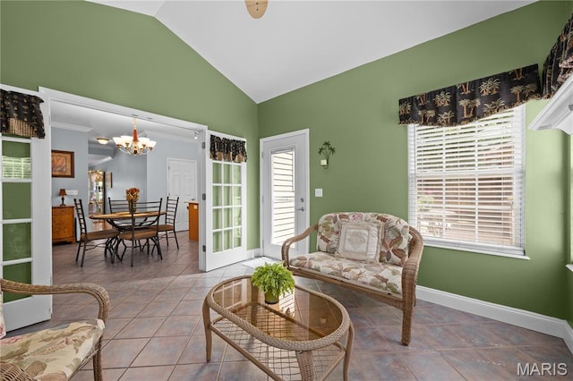 1171 Red Hawk Ridge Ln, Ofallon, IL 62269 - living area featuring a chandelier, vaulted ceiling, healthy amount of natural light, and tile patterned floors