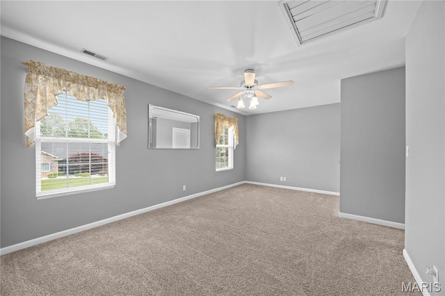 1171 Red Hawk Ridge Ln, Ofallon, IL 62269 - carpeted empty room featuring baseboards, healthy amount of natural light, and a ceiling fan