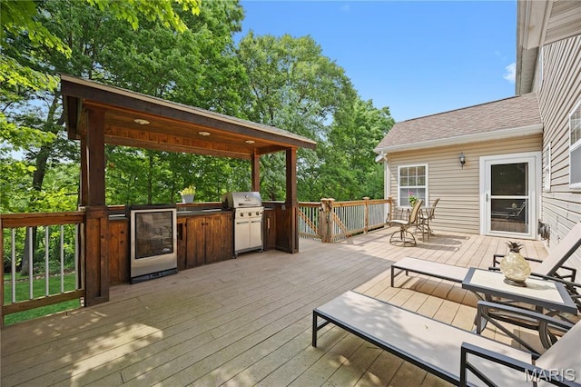 1171 Red Hawk Ridge Ln, Ofallon, IL 62269 - wooden terrace with wine cooler and grilling area