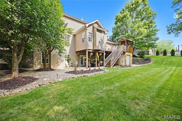 1171 Red Hawk Ridge Ln, Ofallon, IL 62269 - back of house featuring stairway, a deck, and a patio area