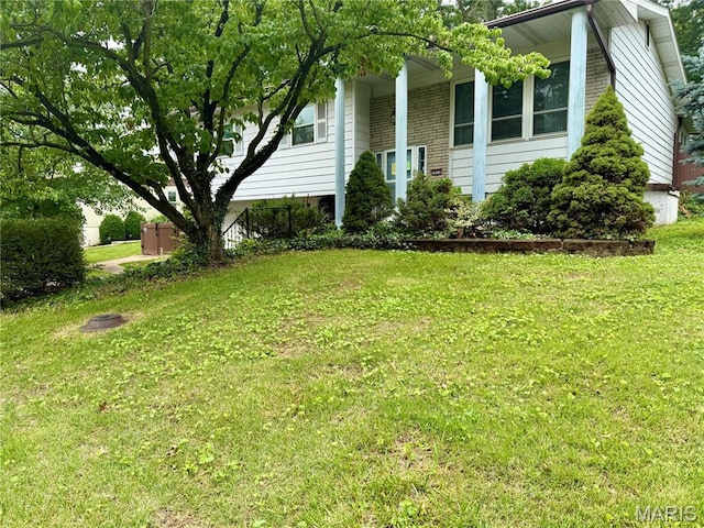 2631 Georgia Dr, Arnold, MO 63010 - view of property exterior with a yard