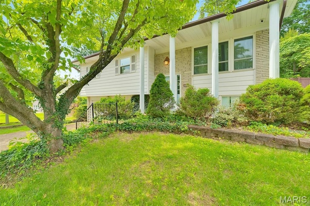 2631 Georgia Dr, Arnold, MO 63010 - bi-level home with a front lawn and brick siding