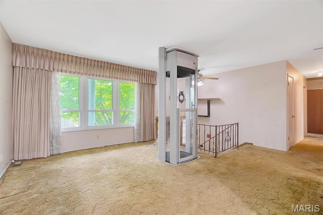 2631 Georgia Dr, Arnold, MO 63010 - carpeted empty room with ceiling fan