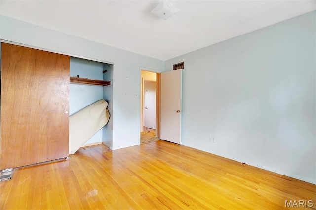 2631 Georgia Dr, Arnold, MO 63010 - unfurnished bedroom featuring a closet and light wood-style floors