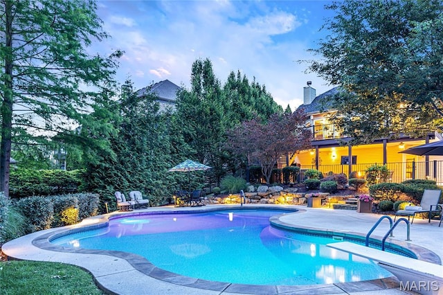 4388 Austin Pass Dr, Saint Charles, MO 63304 - swimming pool featuring a diving board and a patio area