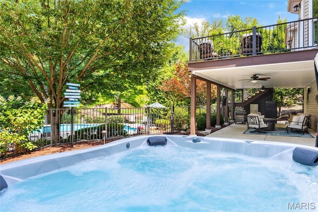 4388 Austin Pass Dr, Saint Charles, MO 63304 - view of pool with a ceiling fan, stairs, a hot tub, and a patio