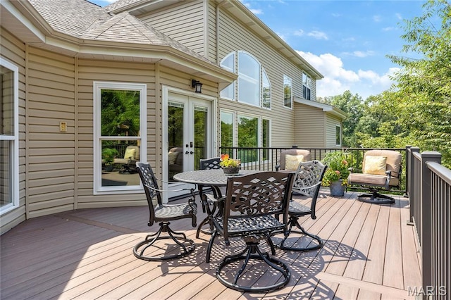 4388 Austin Pass Dr, Saint Charles, MO 63304 - wooden deck featuring french doors and outdoor dining area