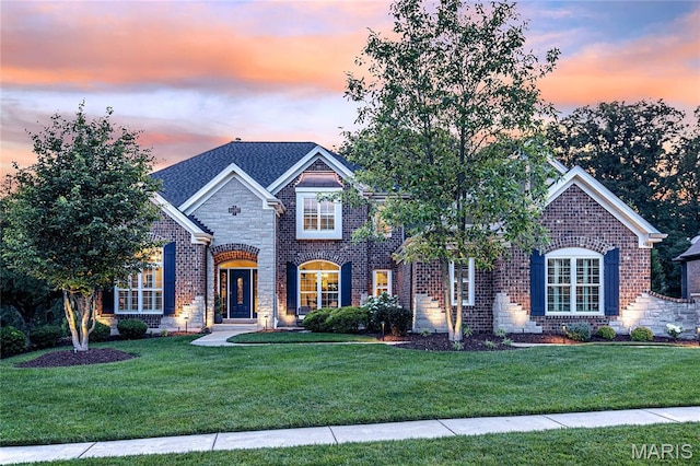 4388 Austin Pass Dr, Saint Charles, MO 63304 - view of front of property with a front yard, brick siding, and stone siding