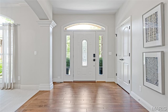 4388 Austin Pass Dr, Saint Charles, MO 63304 - entryway featuring hardwood / wood-style floors and ornate columns