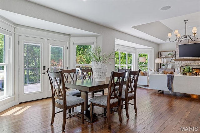 4388 Austin Pass Dr, Saint Charles, MO 63304 - dining room featuring healthy amount of natural light and hardwood / wood-style flooring