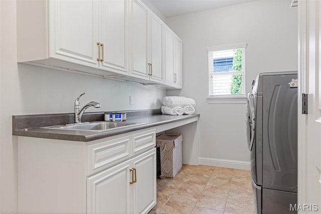 4388 Austin Pass Dr, Saint Charles, MO 63304 - kitchen featuring washer / clothes dryer, white cabinetry, and dark countertops