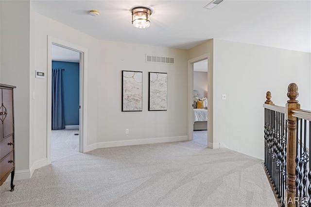 4388 Austin Pass Dr, Saint Charles, MO 63304 - hallway with light carpet and an upstairs landing