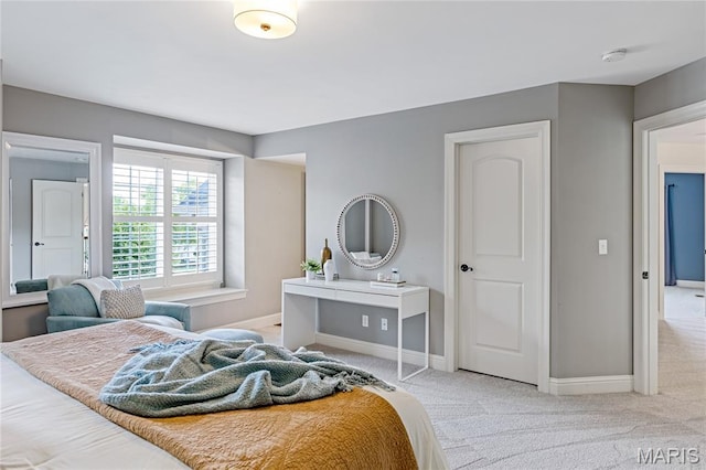 4388 Austin Pass Dr, Saint Charles, MO 63304 - bedroom featuring light carpet and baseboards