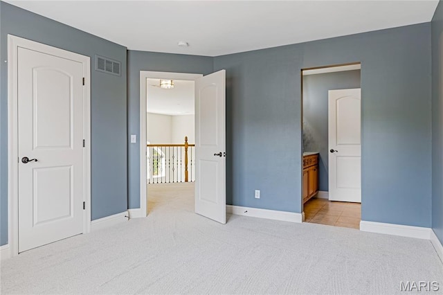 4388 Austin Pass Dr, Saint Charles, MO 63304 - unfurnished bedroom featuring light colored carpet and baseboards