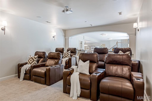 4388 Austin Pass Dr, Saint Charles, MO 63304 - home theater with arched walkways, ornate columns, and carpet floors