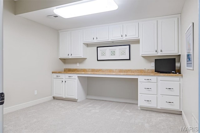 4388 Austin Pass Dr, Saint Charles, MO 63304 - unfurnished office featuring built in desk and light colored carpet