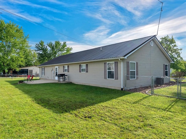 109 N 7th St, Owensville, MO 65066 - rear view of property with metal roof, a patio area, and a standing seam roof