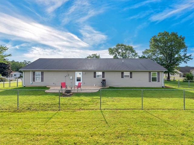 109 N 7th St, Owensville, MO 65066 - back of house featuring metal roof and a patio