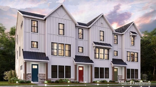 8916 Gateway Cir Unit 41-805, Richmond Heights, MO 63144 - townhome / multi-family property with a standing seam roof, board and batten siding, and metal roof