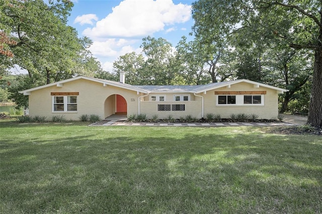 1594 Rue Calais, Bonne Terre, MO 63628 - single story home featuring a front lawn and stucco siding