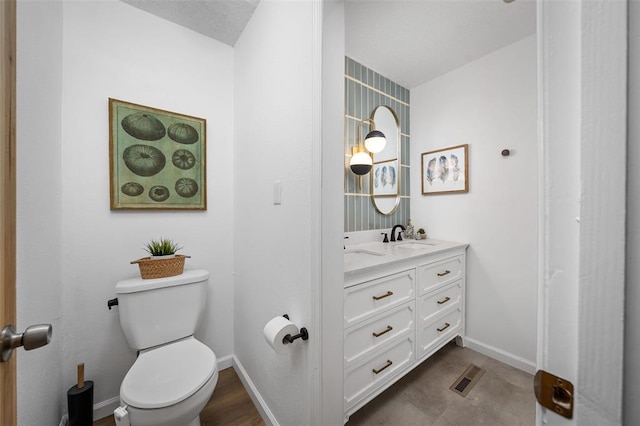 1594 Rue Calais, Bonne Terre, MO 63628 - bathroom with vanity, toilet, and baseboards